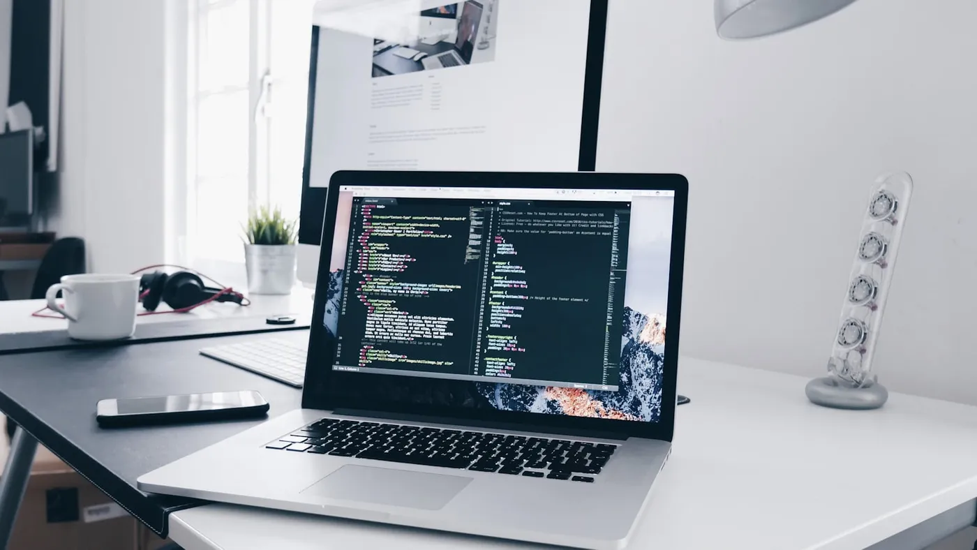 Developer comparing website platform choices in a coding environment